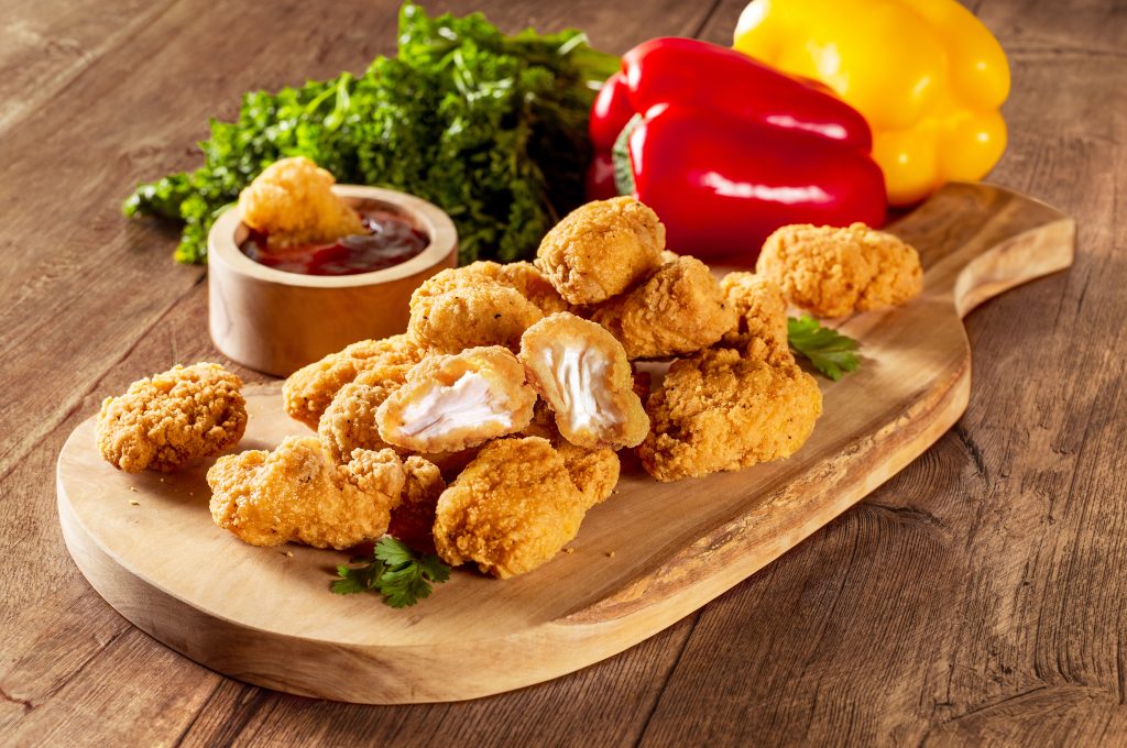 Erie Meats Jumbo Chicken Bites on a rustic style serving platter